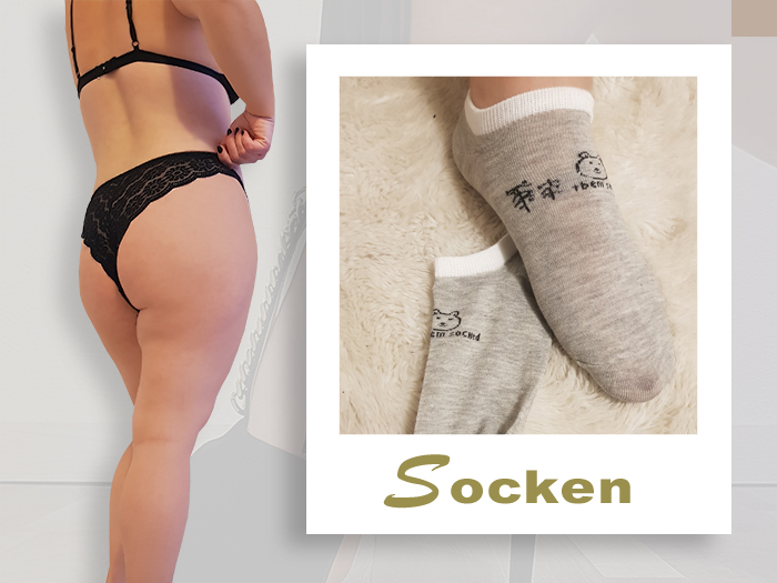 Graue Baumwollsocken mit Bärchenmuster getragen